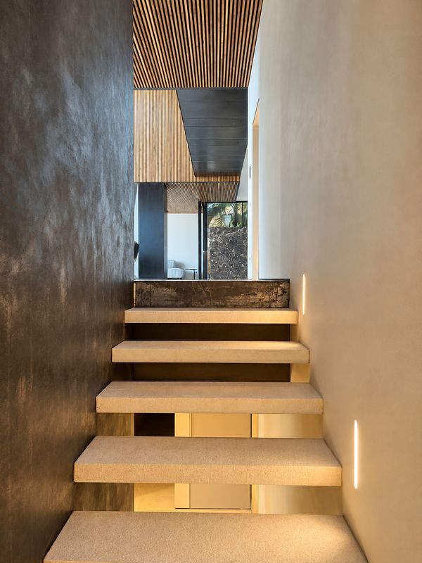 Stone staircase with integrated lighting